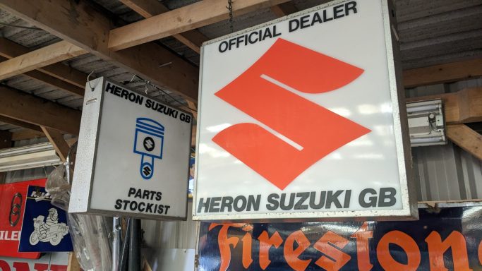 Vintage Suzuki Motorcycle Signs